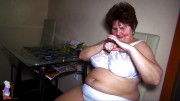 Old chubby Granny does strip in her big panties