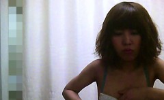 Skinny Asian brunette shows tiny tits under her bra in spyc