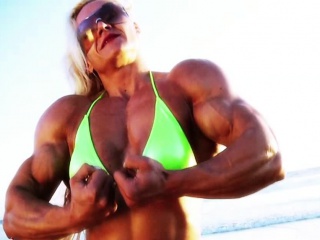 Amazing Muscle Babe showing off outdoors