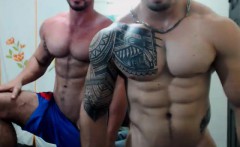 Two muscle gays hooded and electrified