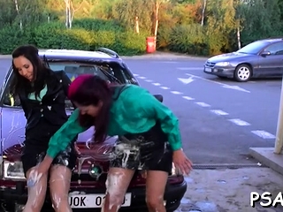 Marvelous girls plays sensually with water and her milk cans