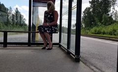 HannaTransa Chastity Crossdresser outdoors at train station.