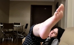 Flexible pale brunette with foot fetish does hot footjob